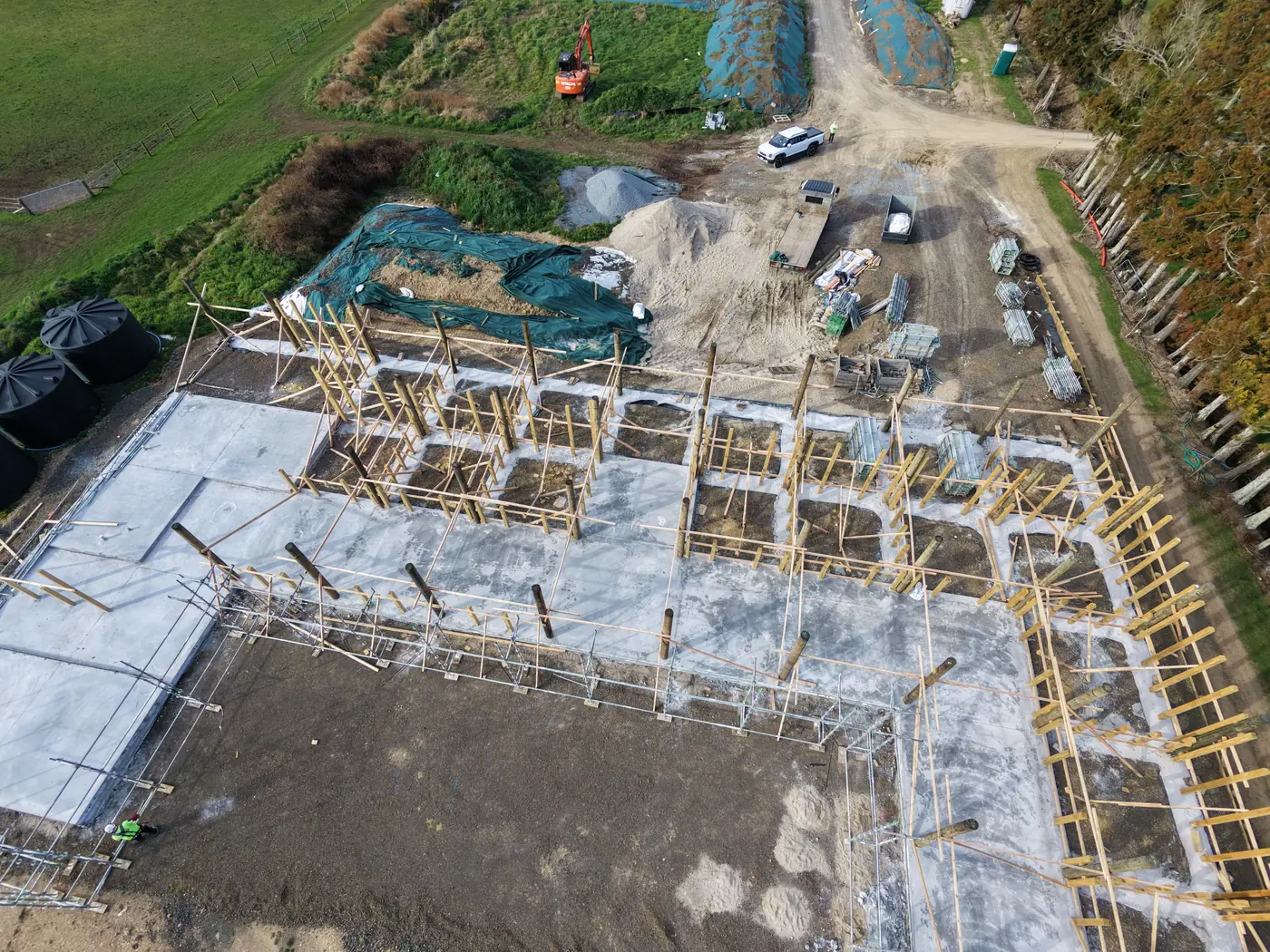 Aerial view of foundation set-out, profiles and poured slab on a GTD Construction site